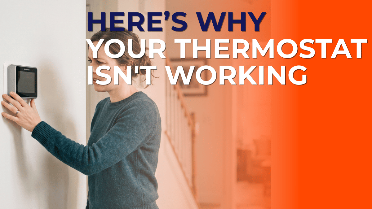 Woman checking an unresponsive wall thermostat in a Central Iowa home, illustrating a thermostat that is not working, with the title "Here's Why Your Thermostat Isn't Working.