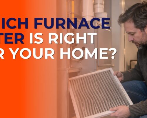 Homeowner pulling a dust-loaded filter from a furnace in a Central Iowa basement